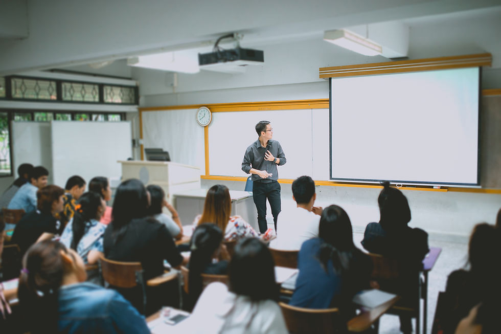 Undergraduate Students and Teacher in a classroom